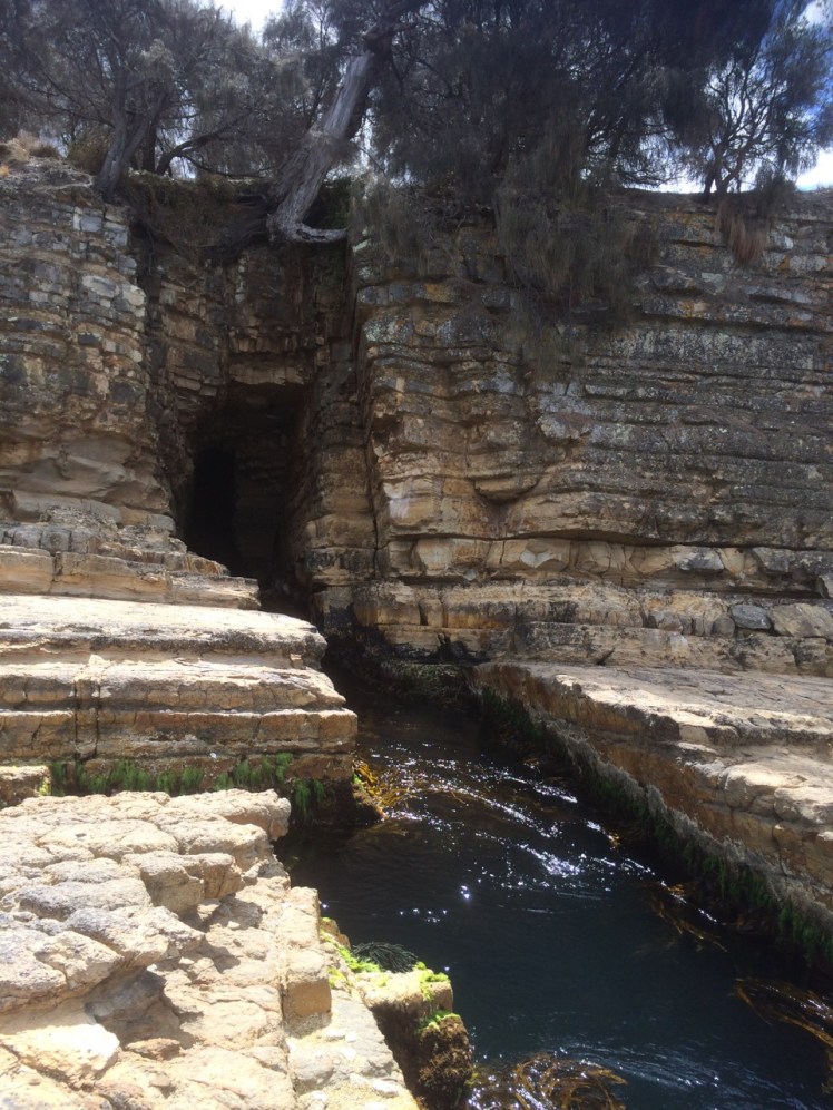Seacave and gulch at Tinderbox Beach